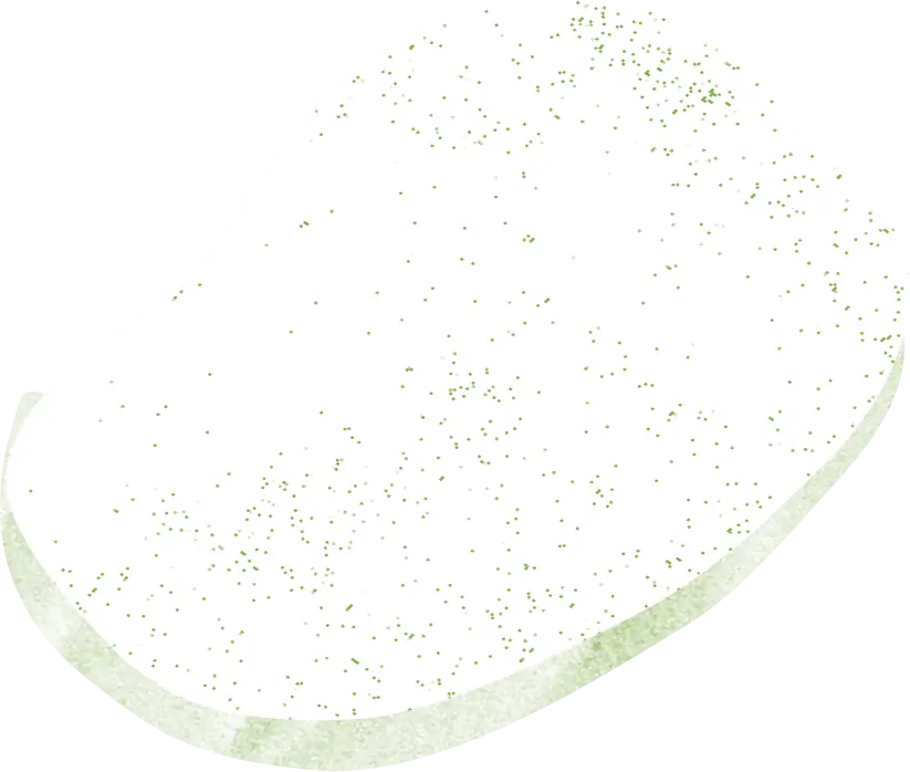 Objet blanc de forme ovale, présentant un léger contour vert et parsemé de minuscules taches vertes à sa surface, sur un fond uni.